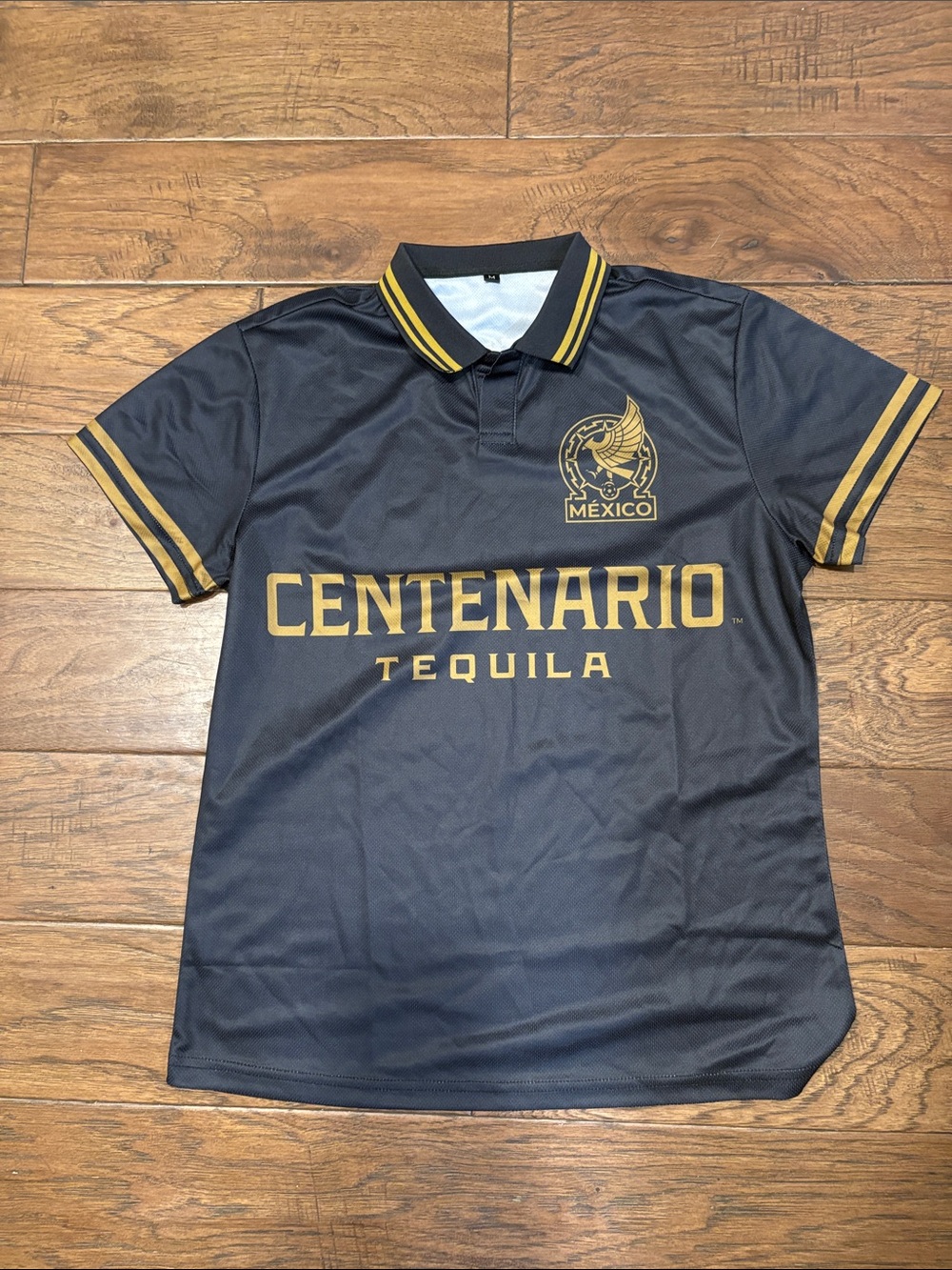 Centenario Tequila Black Polo Tee with Gold Accents